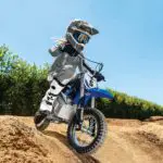 Electric dirt bike for 12 year old - Razor MX350 Dirt Rocket Electric Motocross Off-road Bike for Age 13+, Up to 30 Minutes Continuous Ride Time, 12" Air-filled Tires, Hand-operated Rear Brake, Twist Grip Throttle, Chain-driven Motor Blue - Image 1