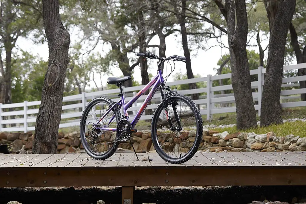 24 inch women's mountain bike - Huffy Hardtail Mountain Bike, Stone Mountain, 24 inch 21-Speed, Lightweight, Purple (74818) Purple 24 Inch Wheels/14 Inch Frame 21 Speed - Image 1